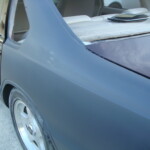 Before and after photographs of a damaged Chevy Impala that was repaired by Elite Paint & Body Shop in West Palm Beach, Florida.